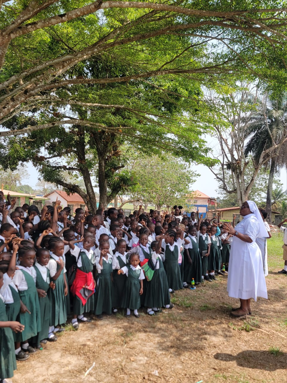 Rev. Sr. Philomena Jappah addressing St. Philomena School during school visit.jpg